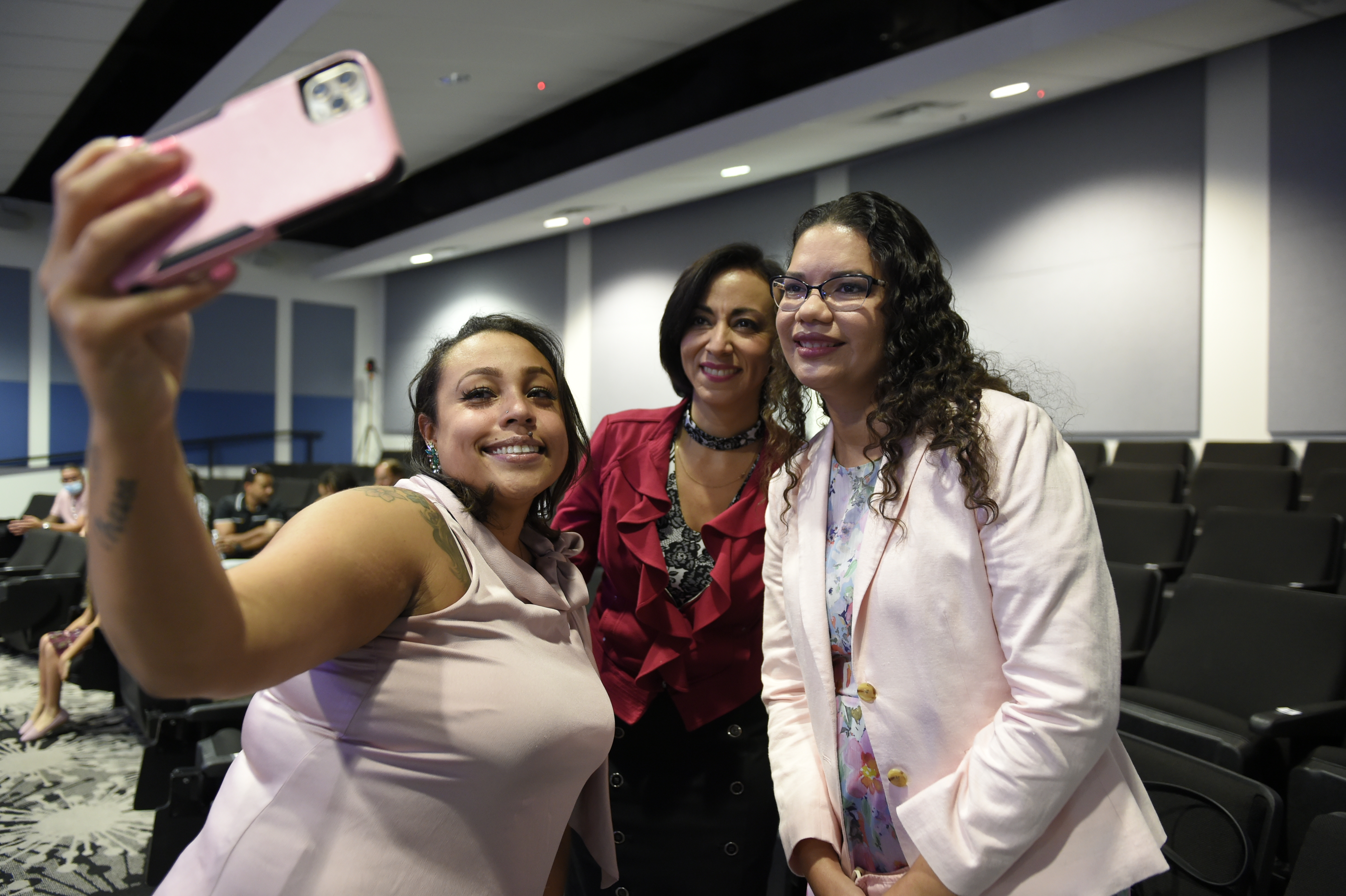 image of gladys sherpa taking a selfie with commissioner bonilla and gabby ortiz