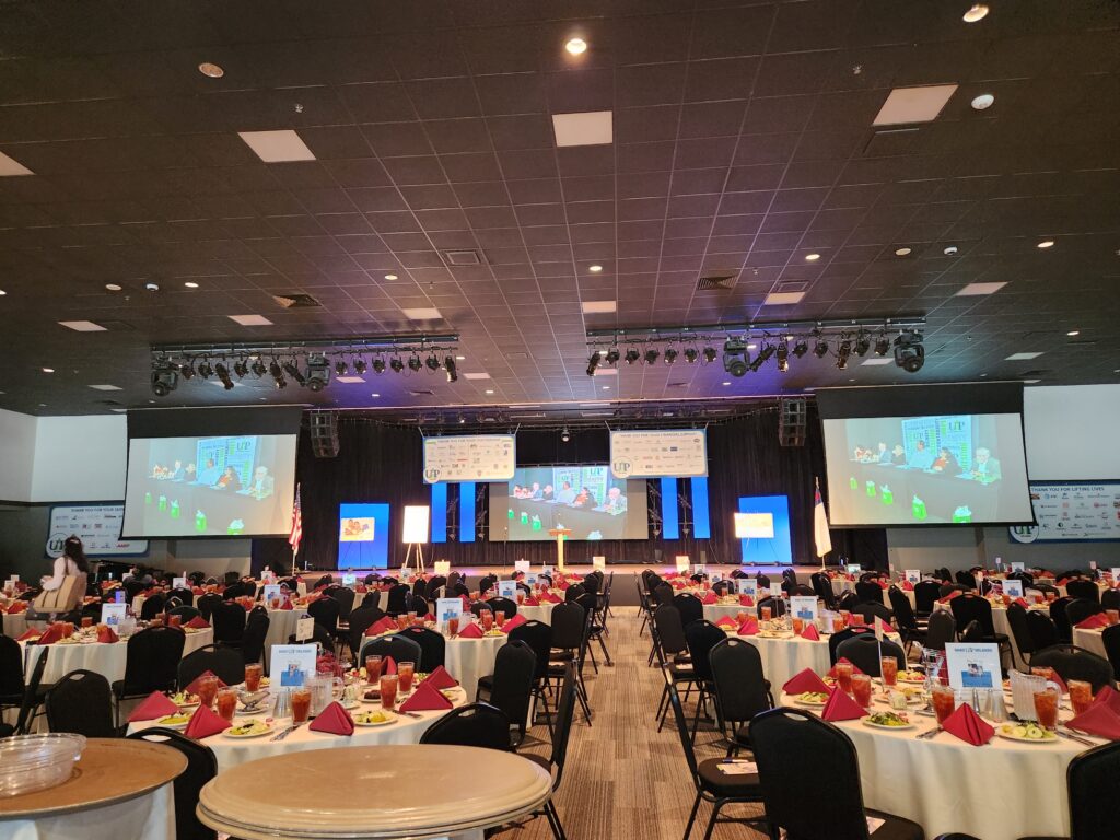 Picture of multiple tables at the Hand Up Luncheon 
