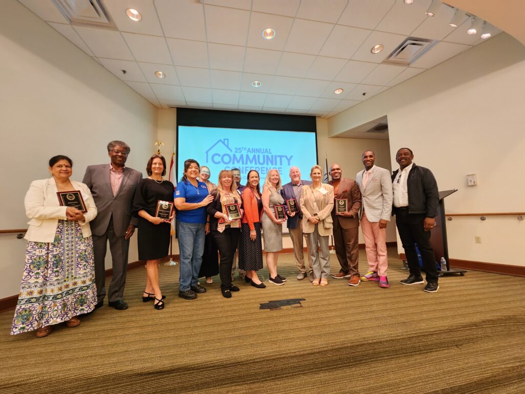 Picture of District nominee winners, Commissioner Nicole Wilson, Commissioner Mayra Uribe, Commissioner Mike Scott and Mayor Jerry Demings