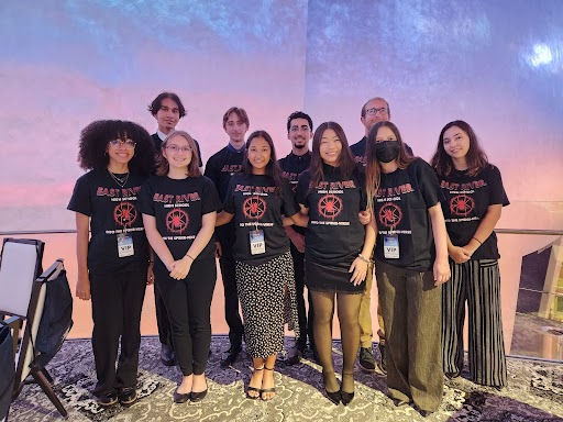 Group photo of the 10 orchestra students who attended the Community Giveback Opportunity: Spider-Man: Into the Spider-Verse Live in Concert