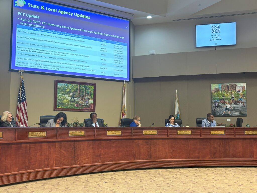 Commissioners and Mayor sit at the dais during the April 9 BCC meeting for an update on Spilt Oak Forest and Wildlife Environmental Area and the Osceola Parkway Extension Update. 