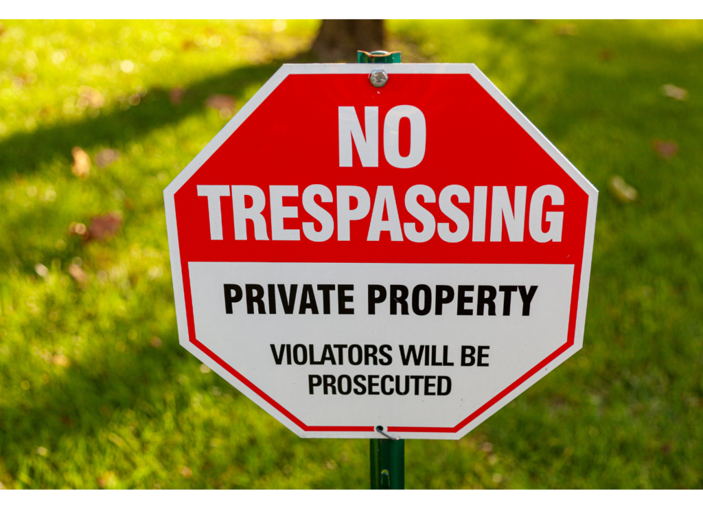 No Trespassing - Private property, violators will be prosecuted.