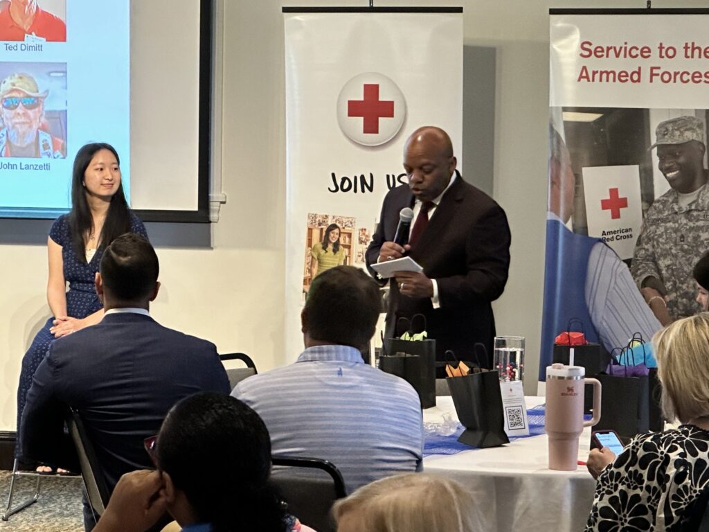 photograph of speakers at the American Red Cross lunch