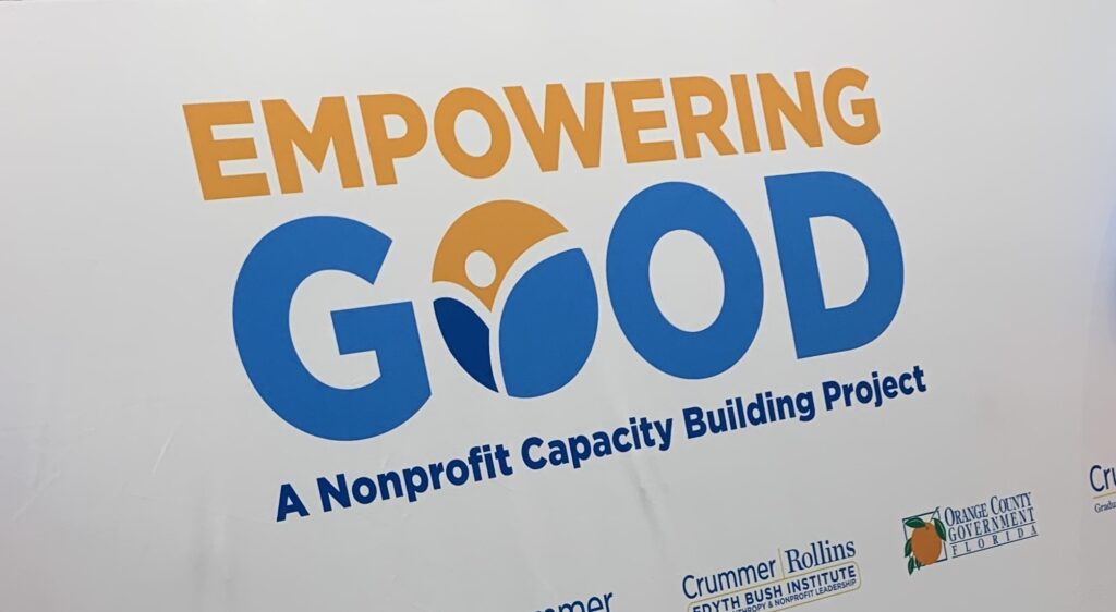 photograph of the logo of the even which reads empowering good