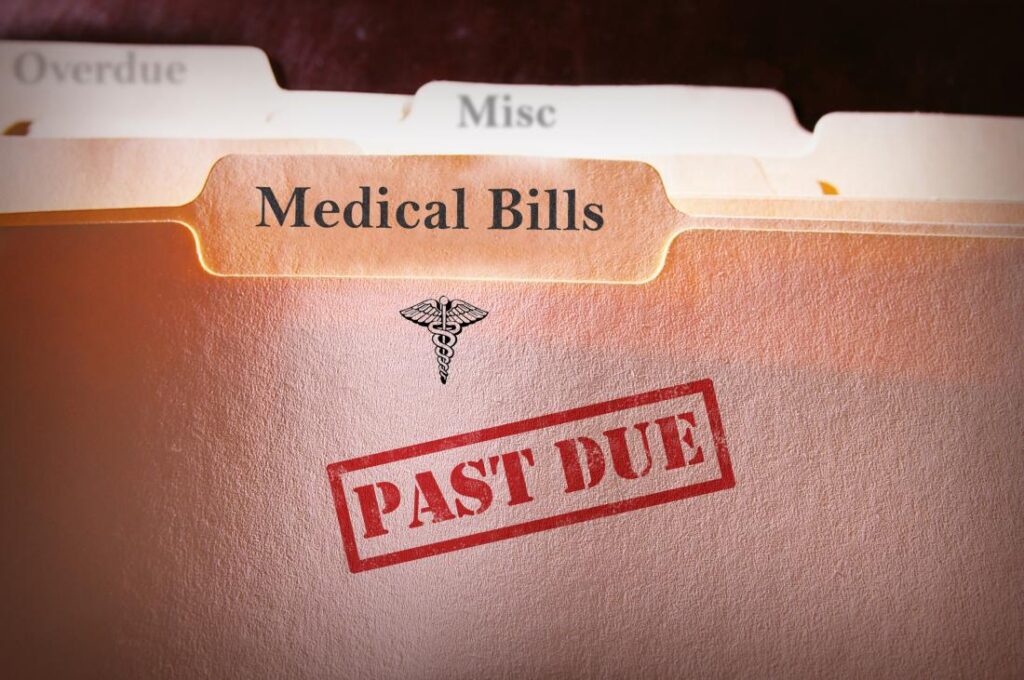 image of a folder labels medical bills with a past due stamp