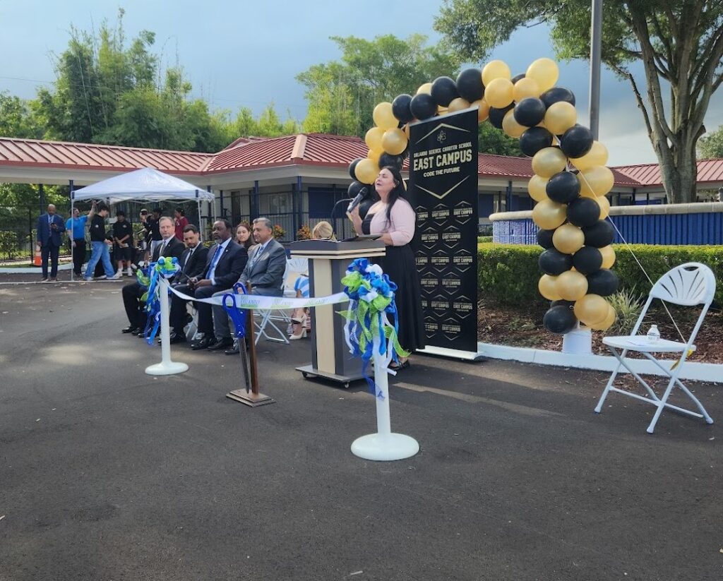 photograph of the ribbon cutting ceremony at orlando science school