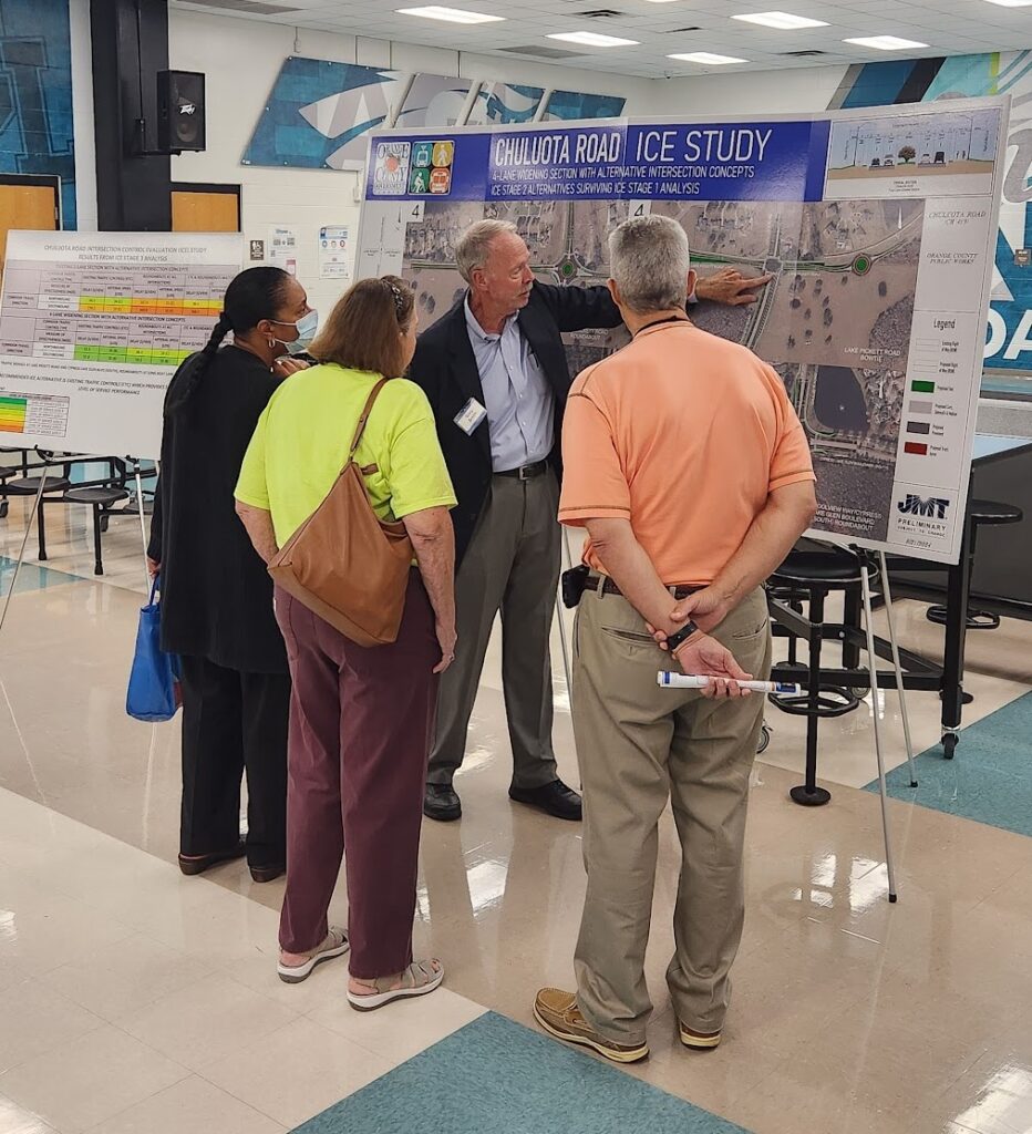 photograph of county staff explaining the recommended changes to Chuluota Road.