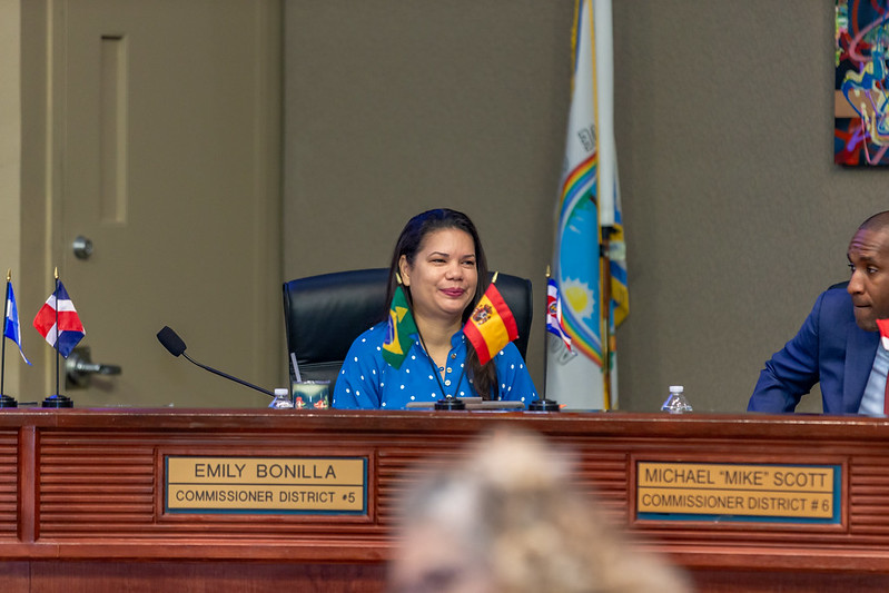 photograph of commissioner Bonilla at the dias